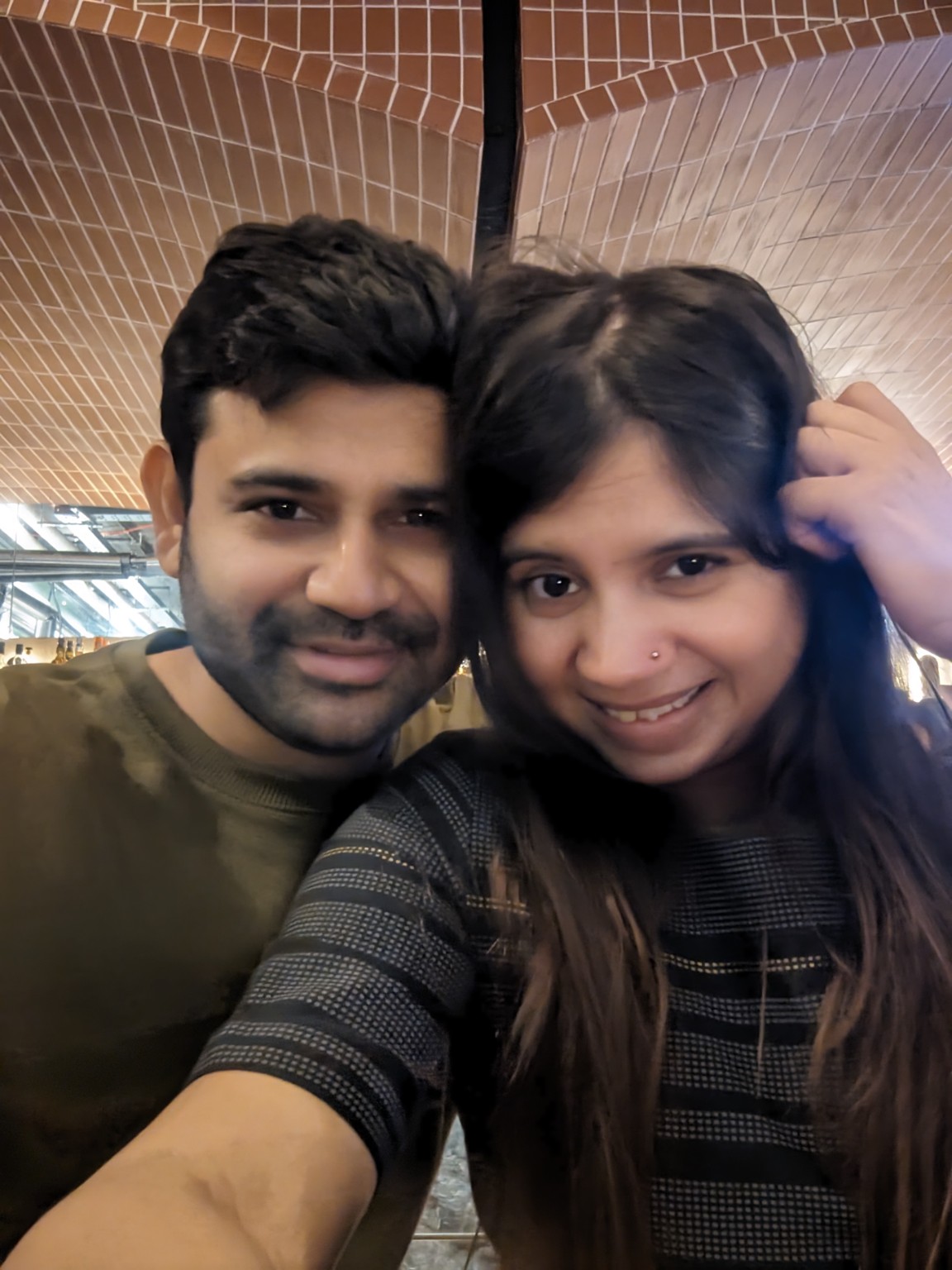 An original café selfie of Snigdha and Somnath together
